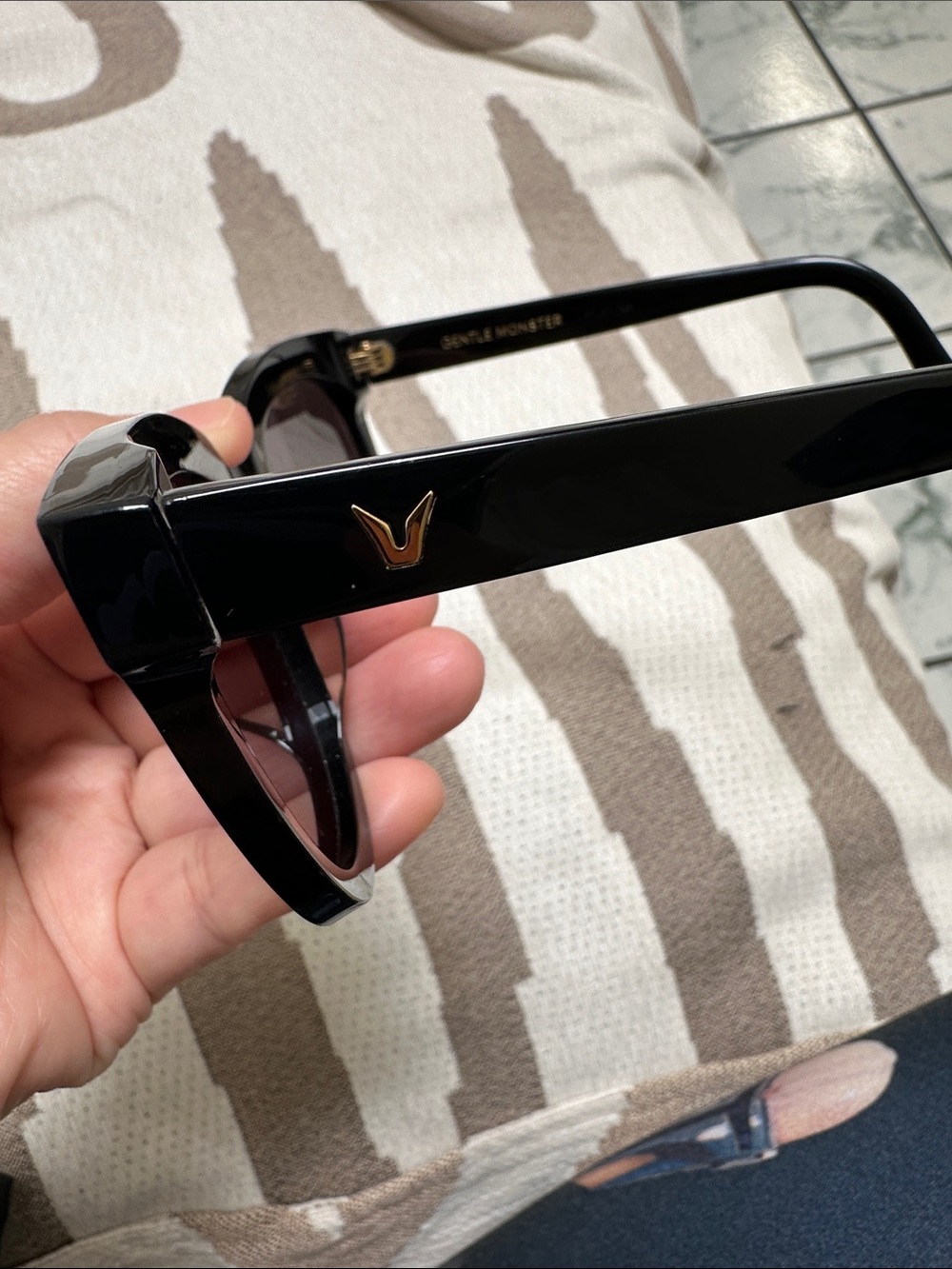 GENTLE MONSTER Black Sunglasses with Gold Accent